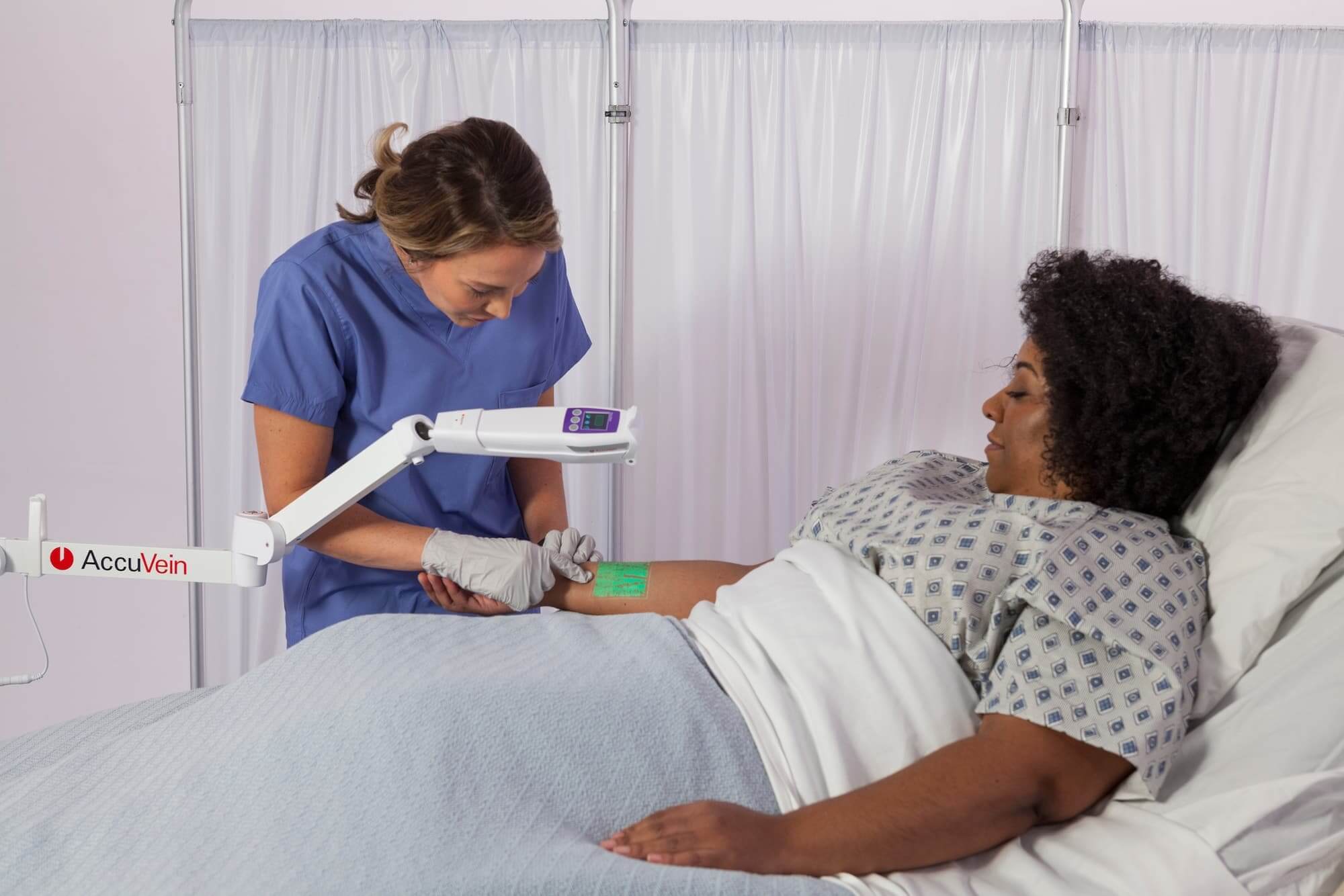AccuVein_AV500_usage1 AccuVein AV500 in use with handsfree wheeled stand